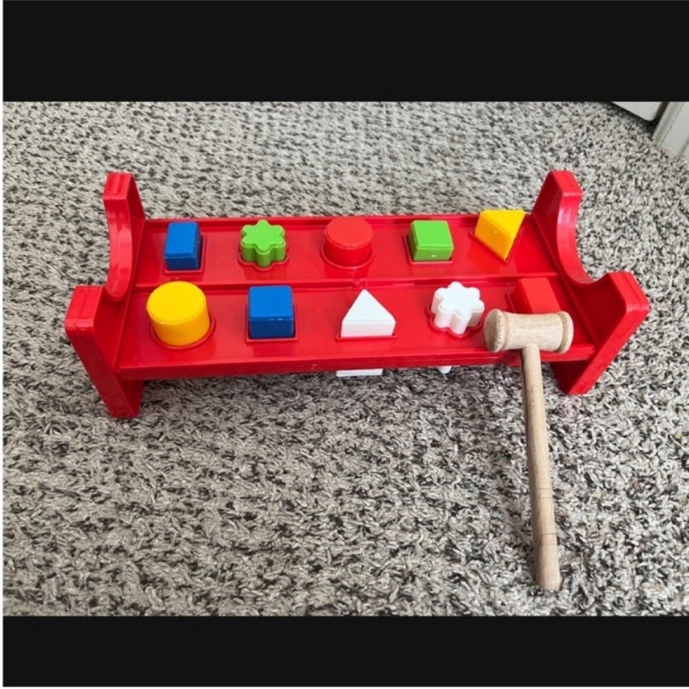 Pound a Peg Toy with hammer